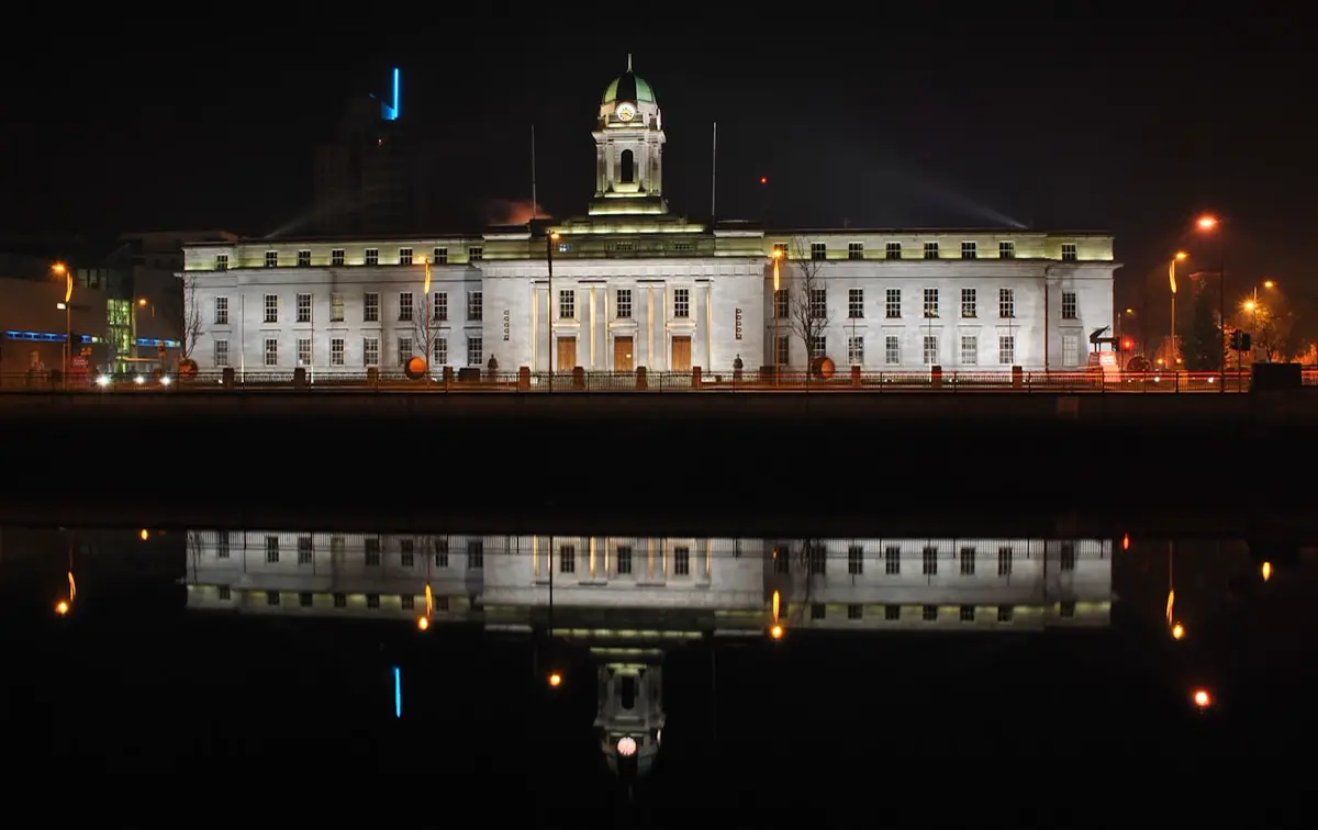 Cork City Hall reflected in the River Lee at night